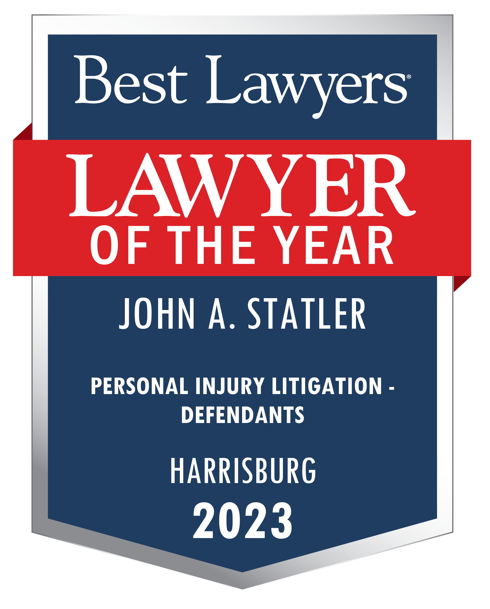 A badge that says John A. Statler lawyer of the year