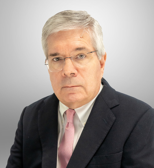 Attorney Richard W Stewart in a black suit and pink tie