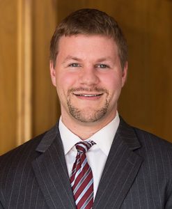 Associate Jason Statler smiles for Johnson Duffie headshot