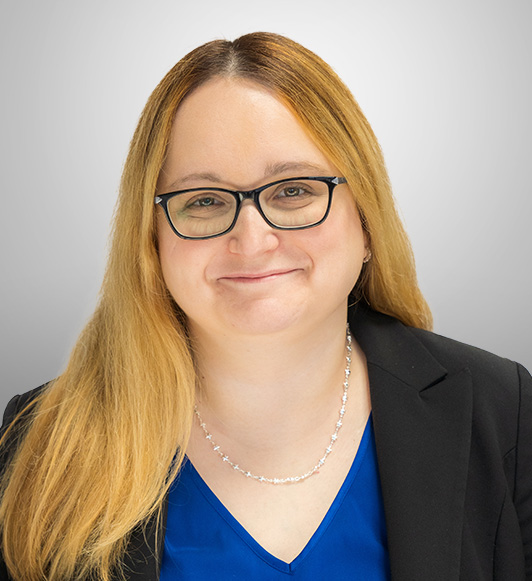 Attorney Theresa Weaver-Barbers in a black blazer and blue shirt